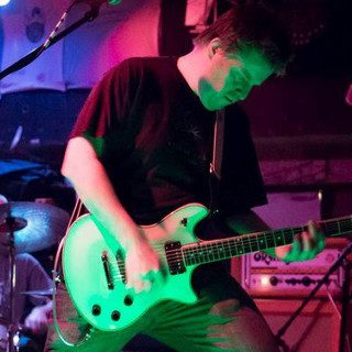 Nothing But Stars Inside live, green-lit guitar